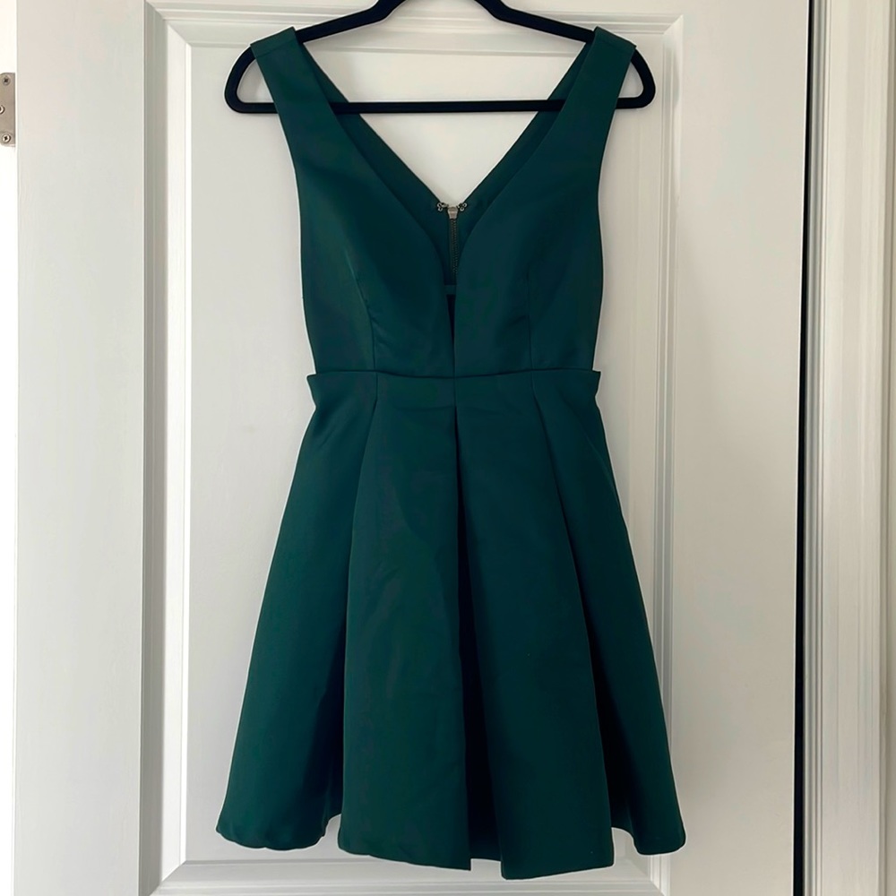 Forest green mini dress with deep V and open sides